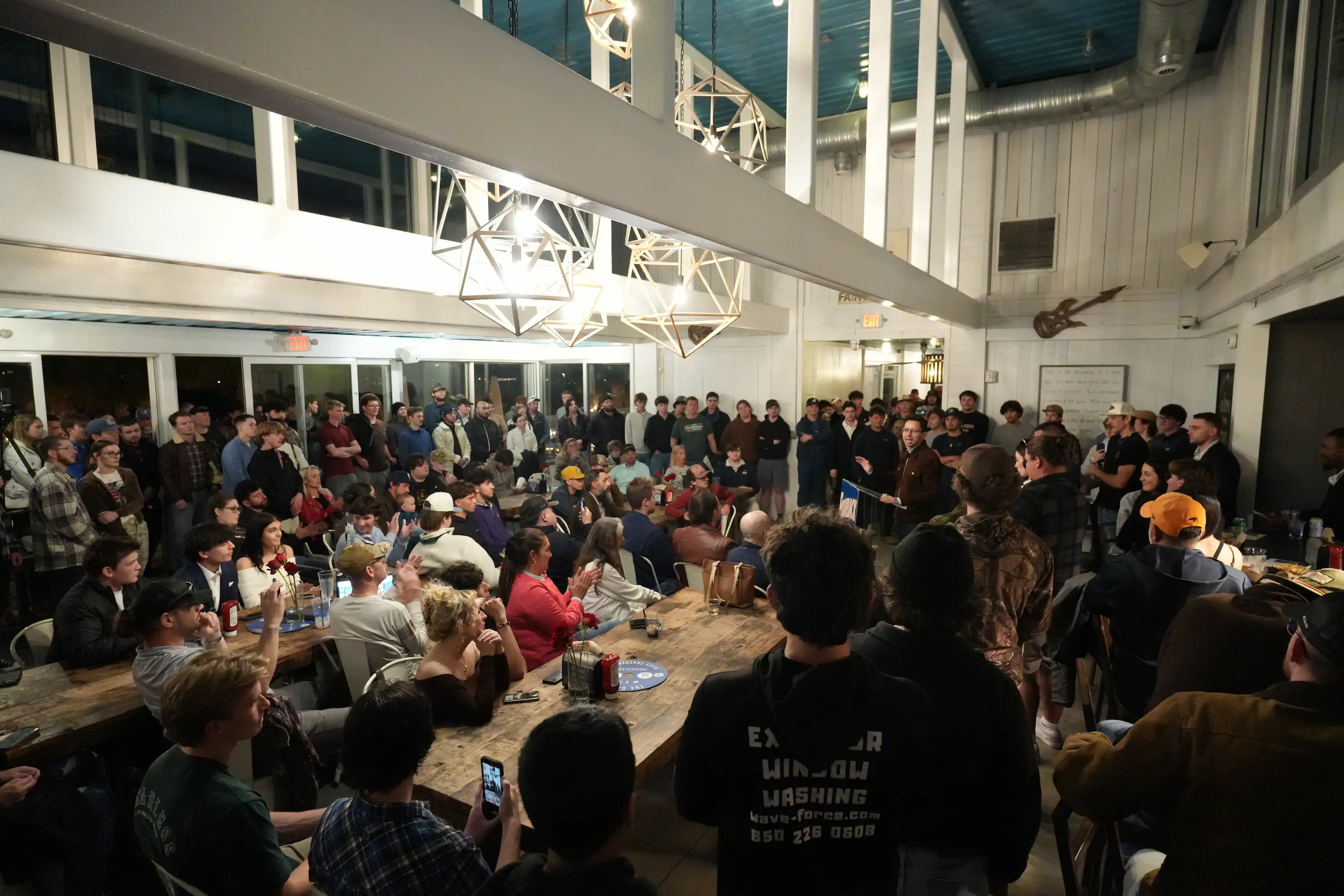 A packed house gathers for a grassroots meet-and-greet.