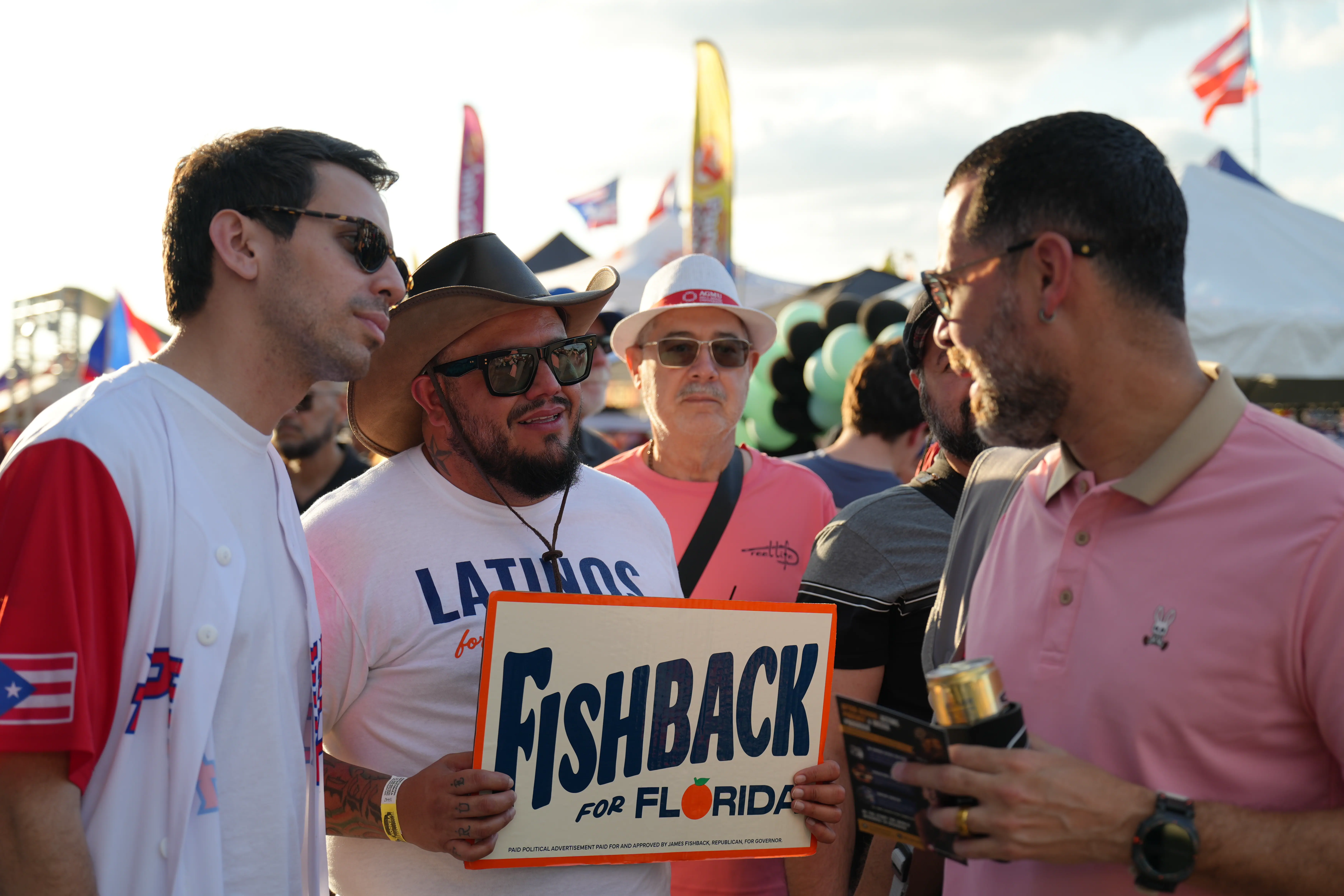 Discussing campaign issues with attendees.