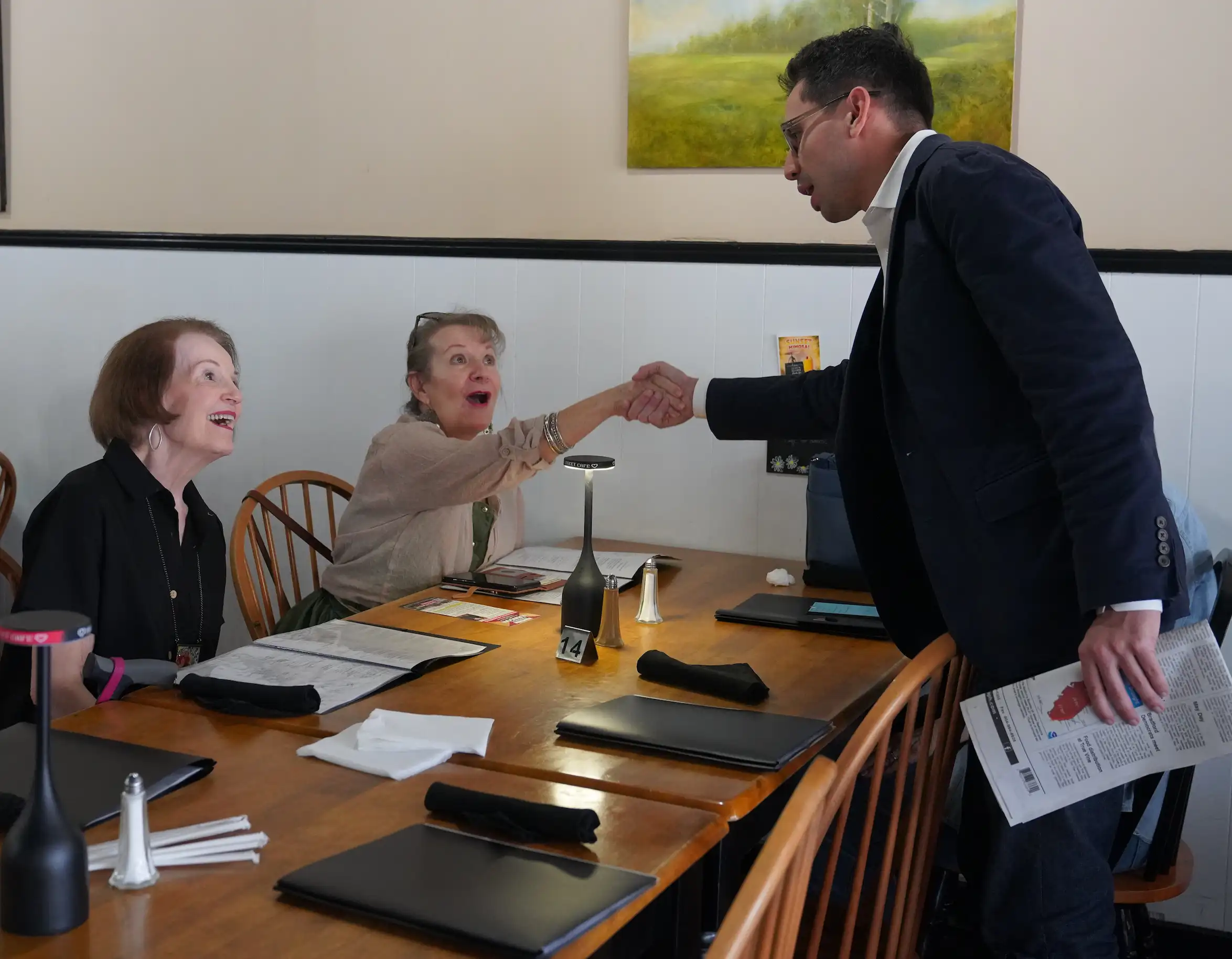Fishback meets attendees after the Call Street Cafe visit.